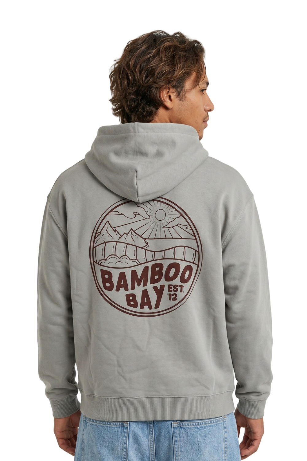 Person wearing a gray hoodie with 'Bamboo Bay' logo on the back, standing against a white background