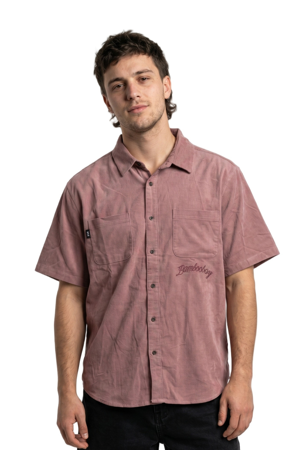 Man wearing a maroon button-up shirt with a logo on a white background