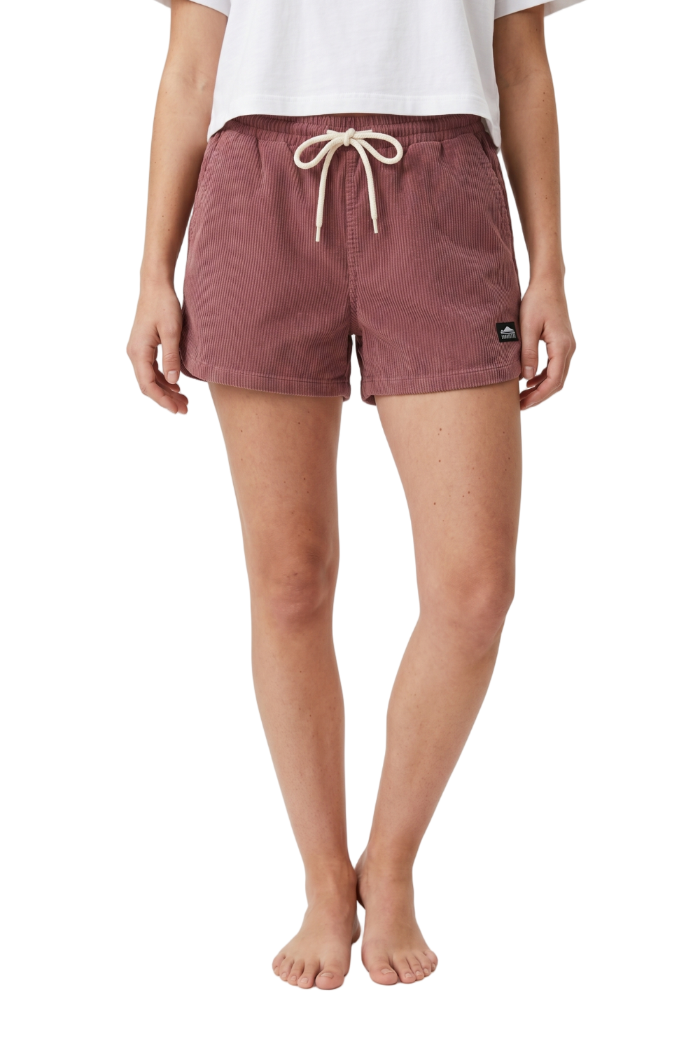 Woman wearing corduroy shorts in mauve with a drawstring and BamBooBay logo on a white background