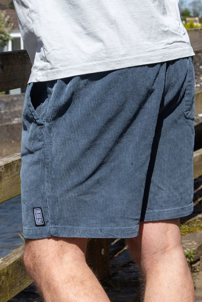 Bamboobay navy cord shorts side view on a model